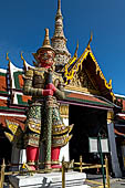 Bangkok Grand Palace, pair of giant yakshas statues the gatekeepers of the entrance of the eastern gallery. Temple of the Emerald Buddha (Wat Phra Kaew). 